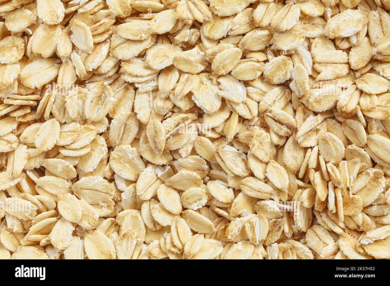 Close up picture of thick rolled oats. Stock Photo