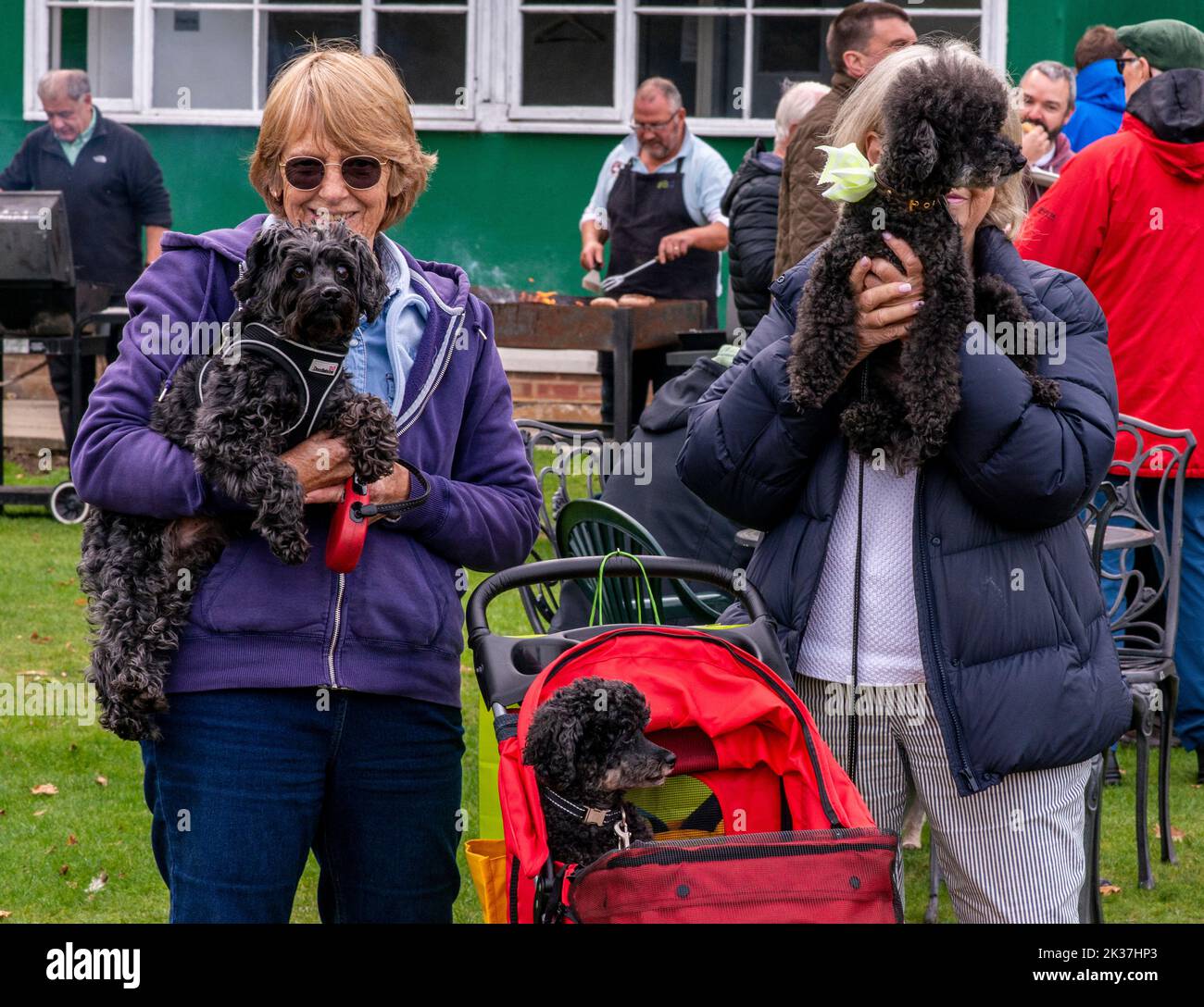 Follifoot, near Harrogate, North Yorkshire, 25th September 2022. The Follifoot Dog Festival where dog lovers were able to show off their beloved pets today. Marienne and her friend with their dogs Dolly, Teddy and Jack. Picture Credit: ernesto rogata/Alamy Live News Stock Photo