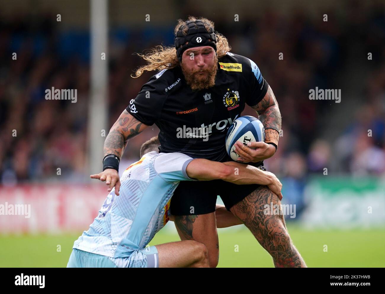 Exeter Chiefs' Harry Williams (right) is tackled by Harlequins' Lewis Gjaltema during the Gallagher Premiership match at Sandy Park, Exeter. Picture date: Sunday September 25, 2022. Stock Photo