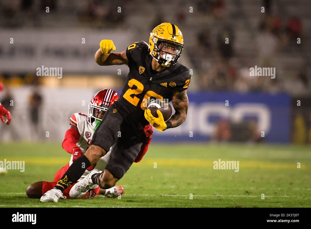 Arizona State wide receiver Giovanni Sanders (20) attempts to break free in the fourth quarter of an NCAA college football game against the Utah Utes Stock Photo