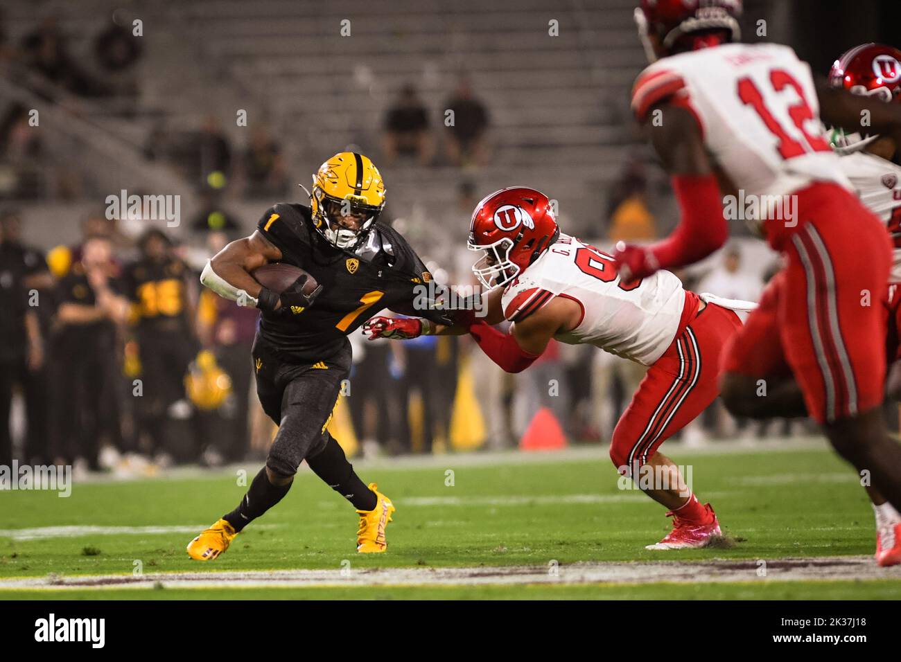 Arizona State running back Xazavian Valladay (1) attempts to break free in the fourth quarter of an NCAA college football game against the Utah Utes i Stock Photo