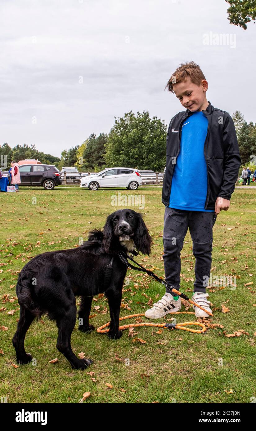 Follifoot, near Harrogate, North Yorkshire, 25th September 2022. The Follifoot Dog Festival where dog lovers were able to show off their beloved pets today. Alphie with his dog Marley. Picture Credit: ernesto rogata/Alamy Live News Stock Photo