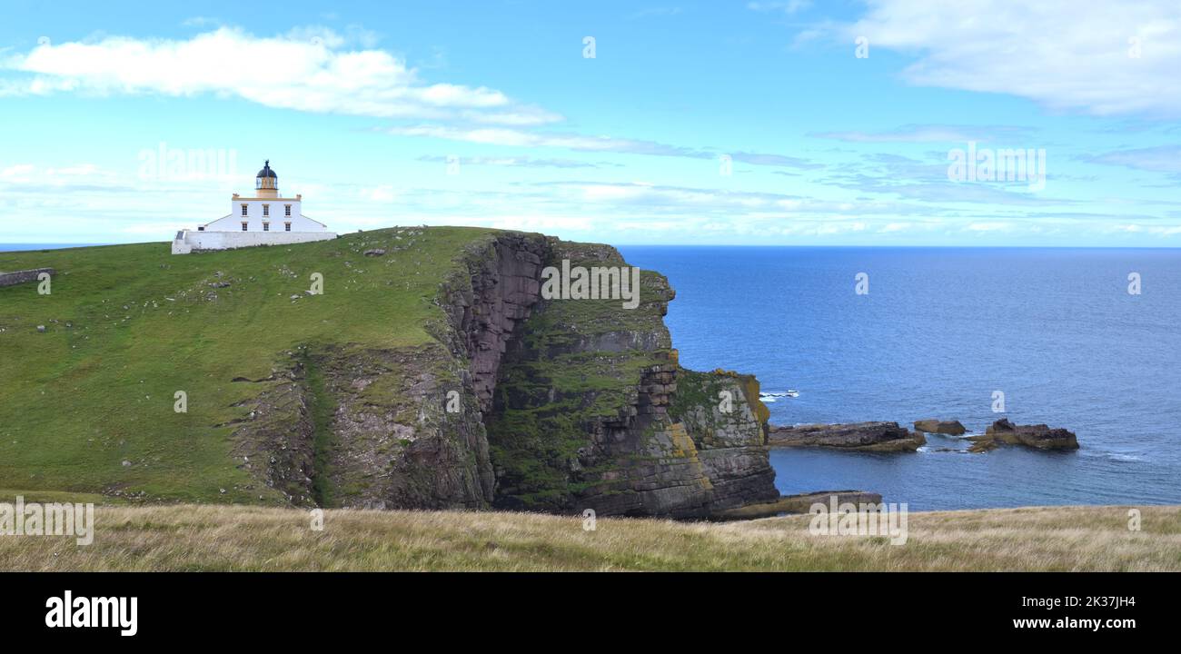 Stoer Lighthouse on the west coast of Scotland overlooking the Atlantic ocean. Stock Photo
