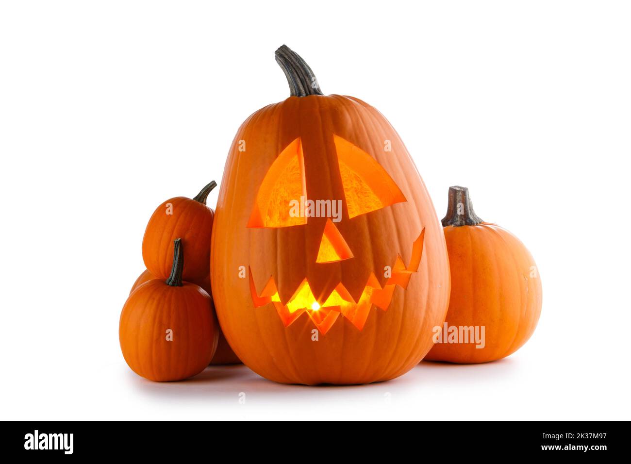 Halloween pumpkins isolated on white background, carved pumpkin with burning candle inside Stock Photo
