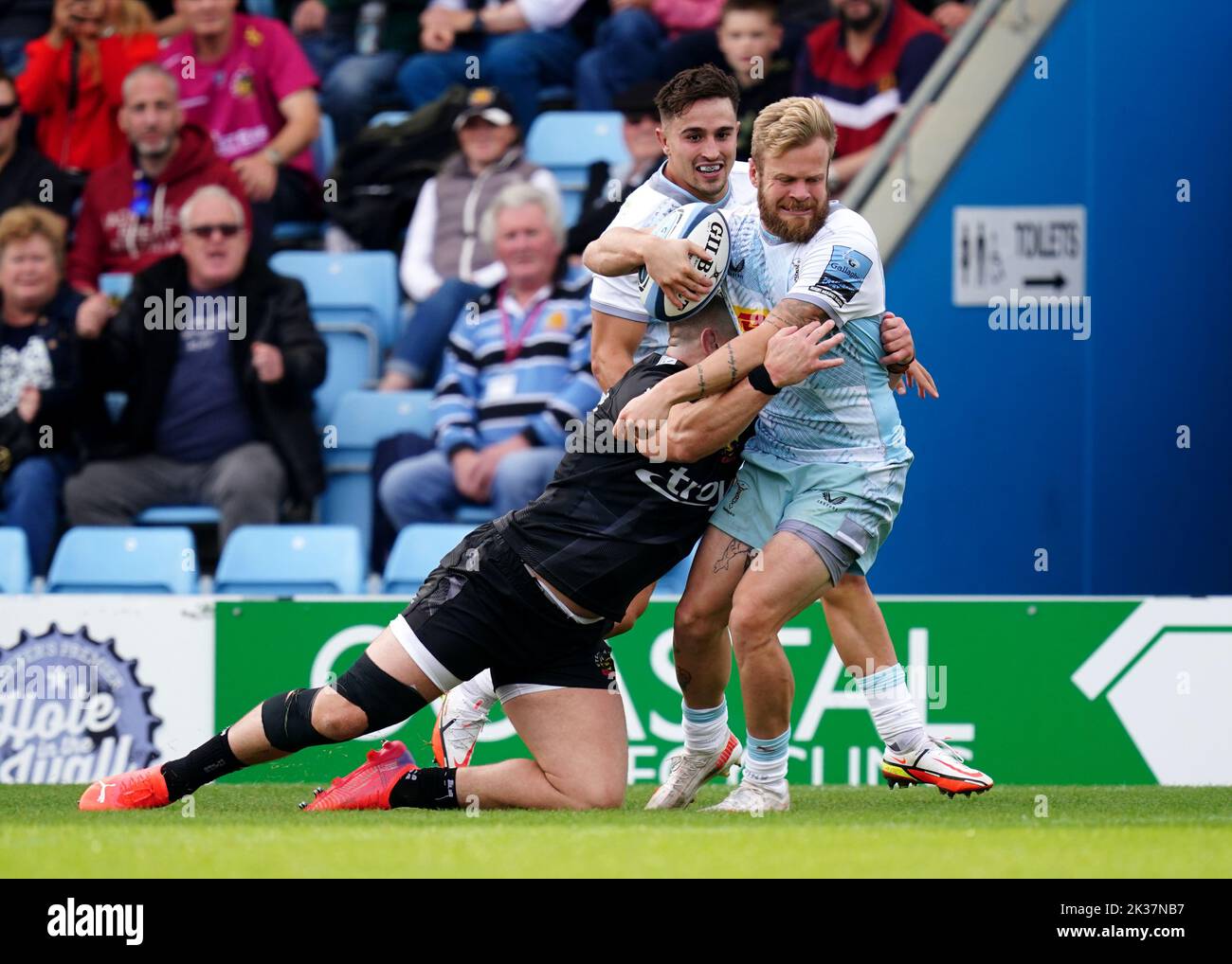 Harlequins' Tyrone Green is tackled but still scores their side's second try during the Gallagher Premiership match at Sandy Park, Exeter. Picture date: Sunday September 25, 2022. Stock Photo