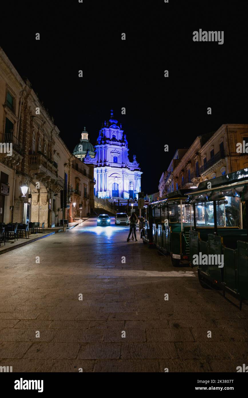 Taxi (and touristic train) at Ragusa Ibla Stock Photo