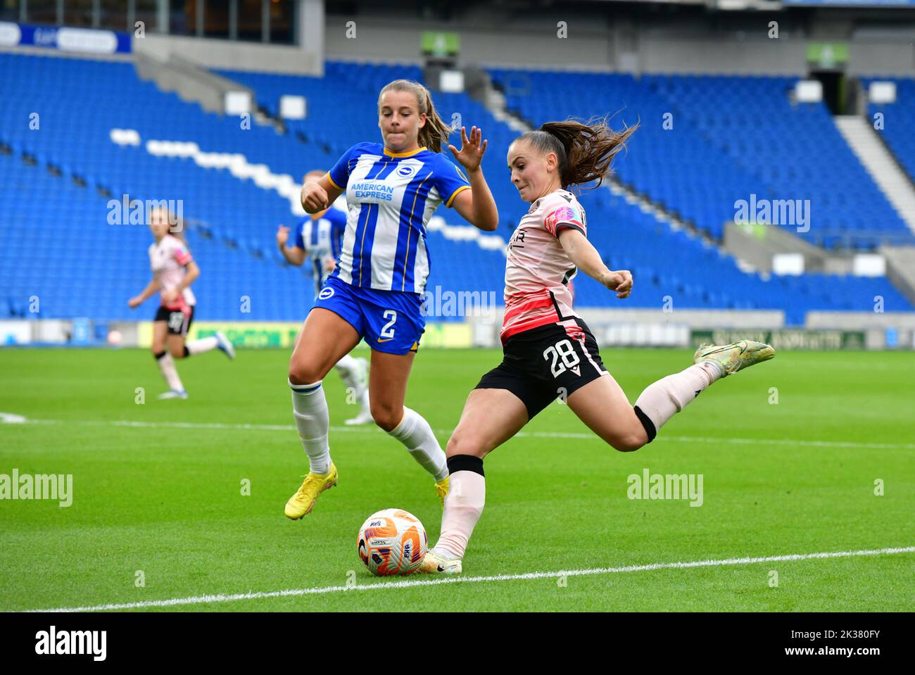 Brighton And Hove, UK. 25th Sep, 2022. Jorja Fox of Brighton and Hove Albion goes in for the block on the attempted cross by Lily Woodham of Reading during the FA Women's Super League match between Brighton & Hove Albion Women and Reading Women at American Express Community Stadium on September 25th 2022 in Brighton and Hove, United Kingdom. (Photo by Jeff Mood/phcimages.com) Credit: PHC Images/Alamy Live News Stock Photo