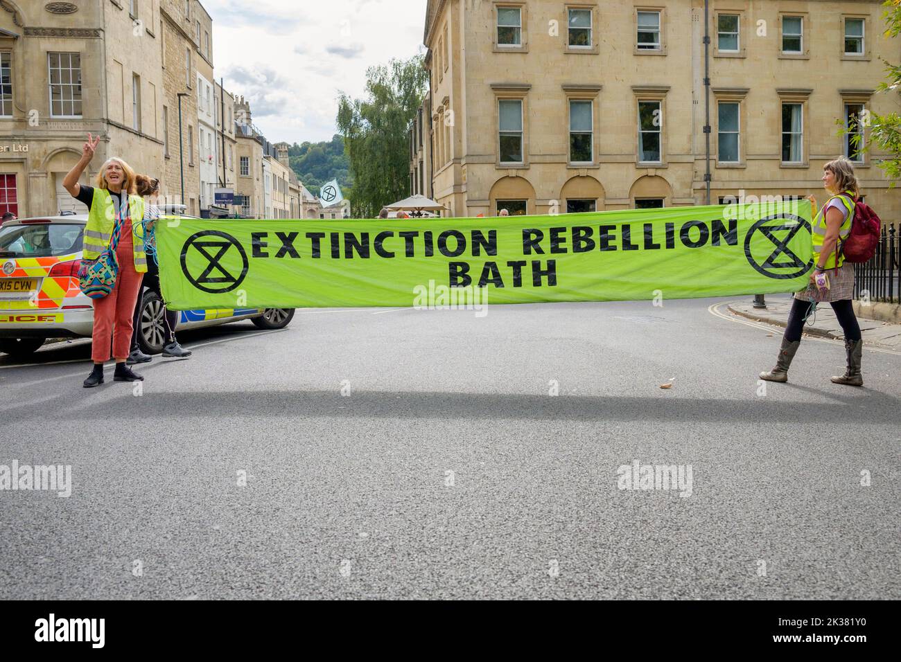 Bath, UK. 25th Sep, 2022. With PM Liz Truss signalling an acceleration of oil and gas extraction in the UK climate change protesters are pictured as they take part in a protest march through the centre of Bath. The protest organised by Extinction Rebellion was held in order to highlight how the cost of living crisis and the climate crisis are interlinked. Credit: Lynchpics/Alamy Live News Stock Photo