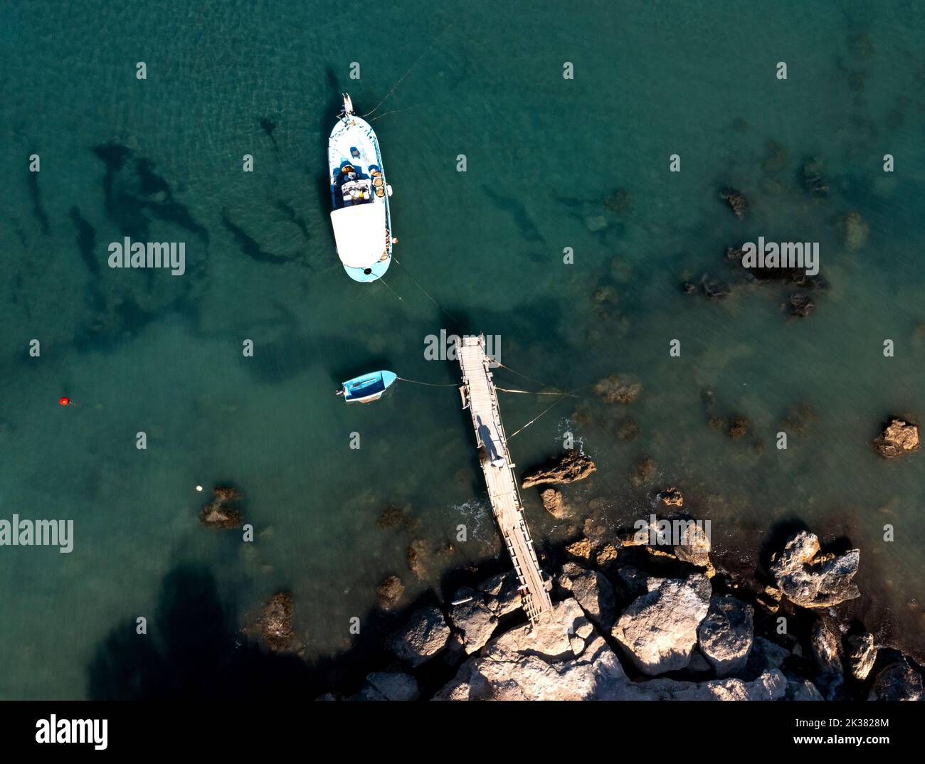 Aerial view of a fishing boat moored in Avdimou Bay, Limassol district Cyprus. Stock Photo