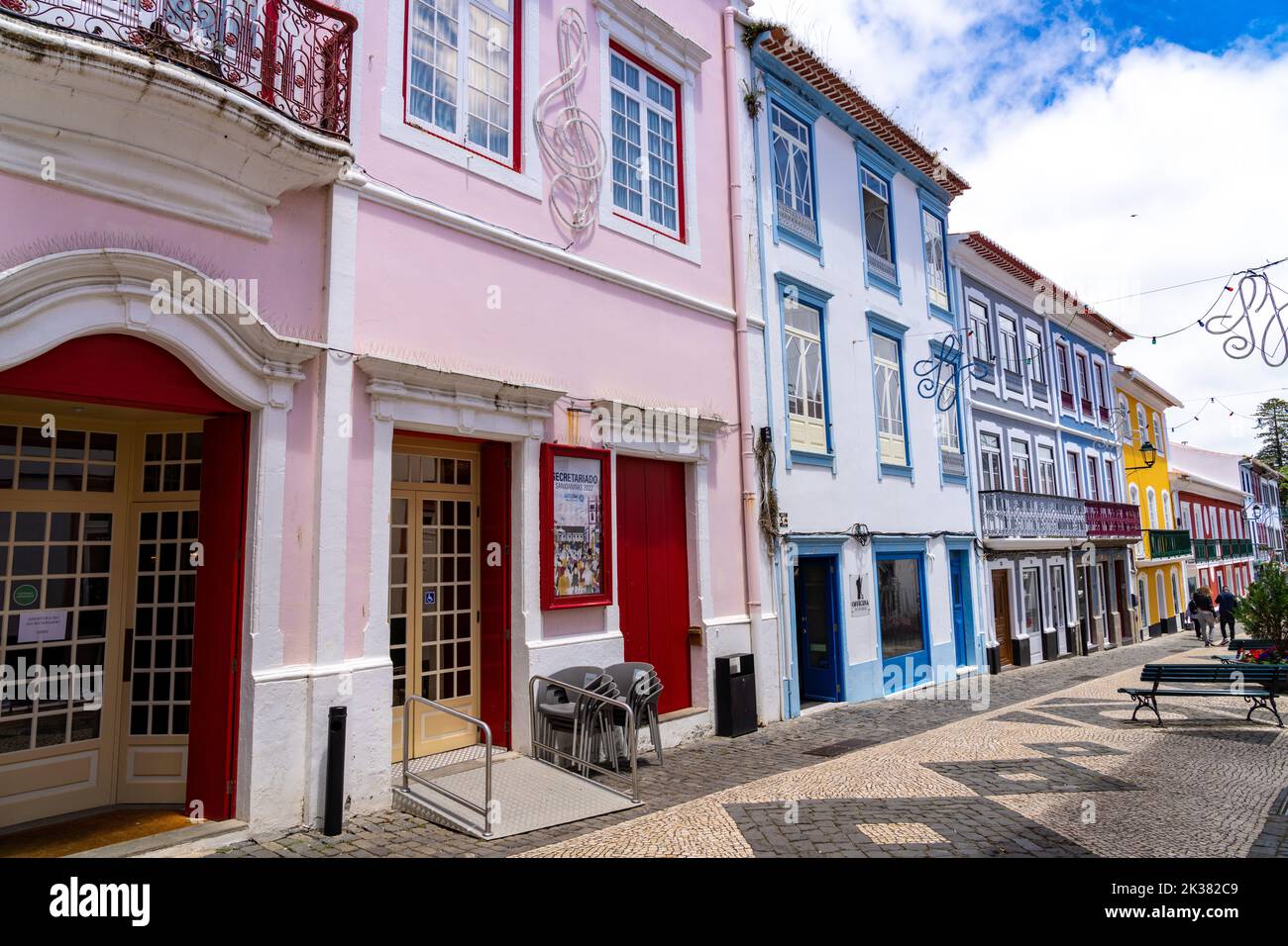 The pink facade of the Teatro Angrense, a performance art theatre built in the 1850’s in Angra do Heroismo, Terceira Island, Azores, Portugal. Stock Photo