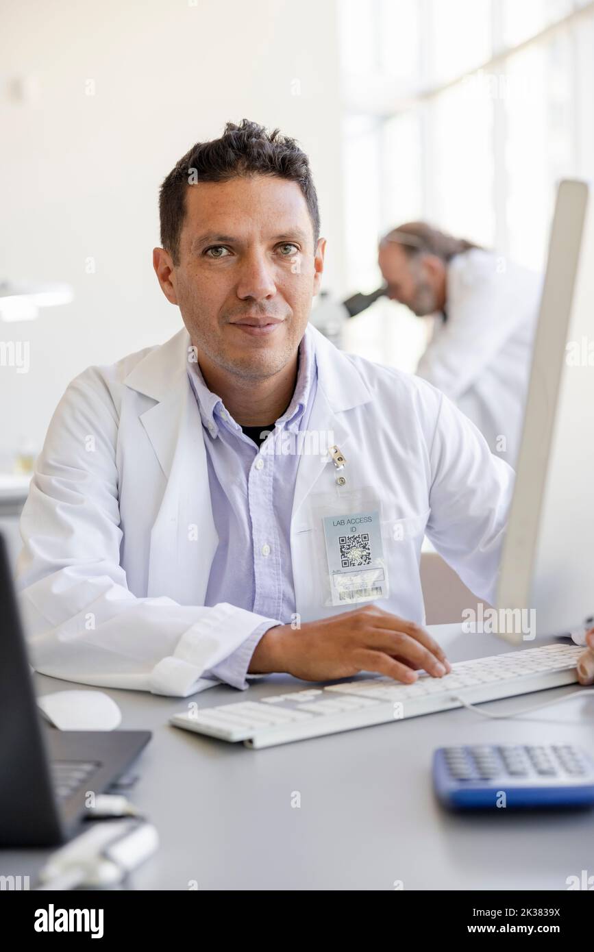 Handsome scientist hi-res stock photography and images - Alamy