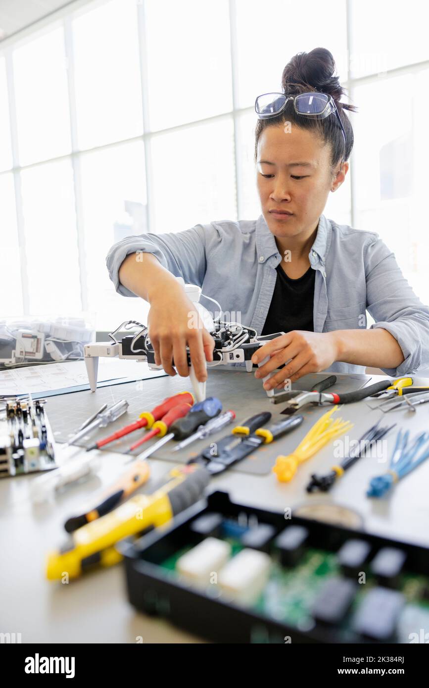 Female engineer assembling robotics Stock Photo Alamy