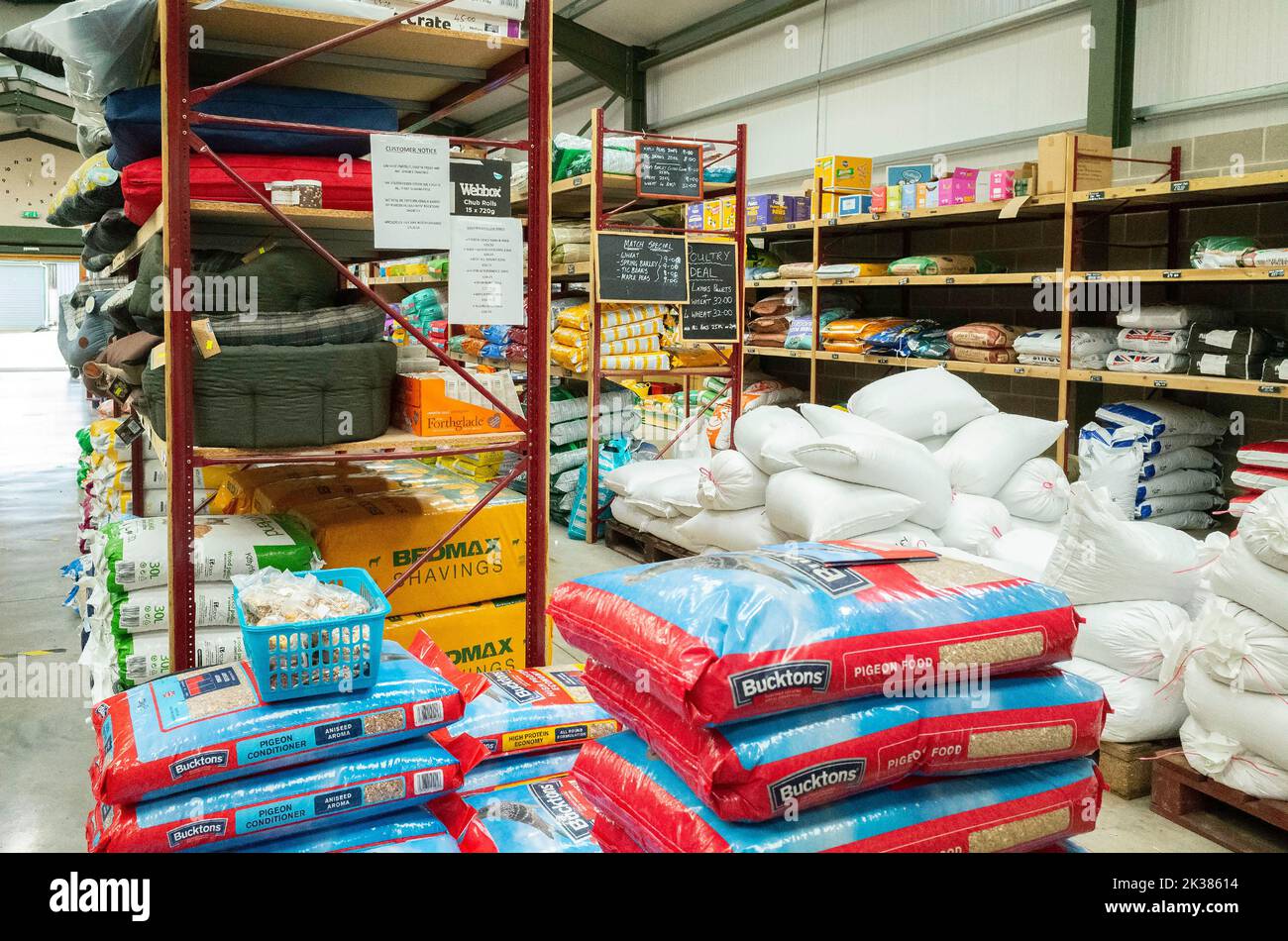 Farm shop interior with self service of food and bedding for pigeons poultry and pet animals Stock Photo