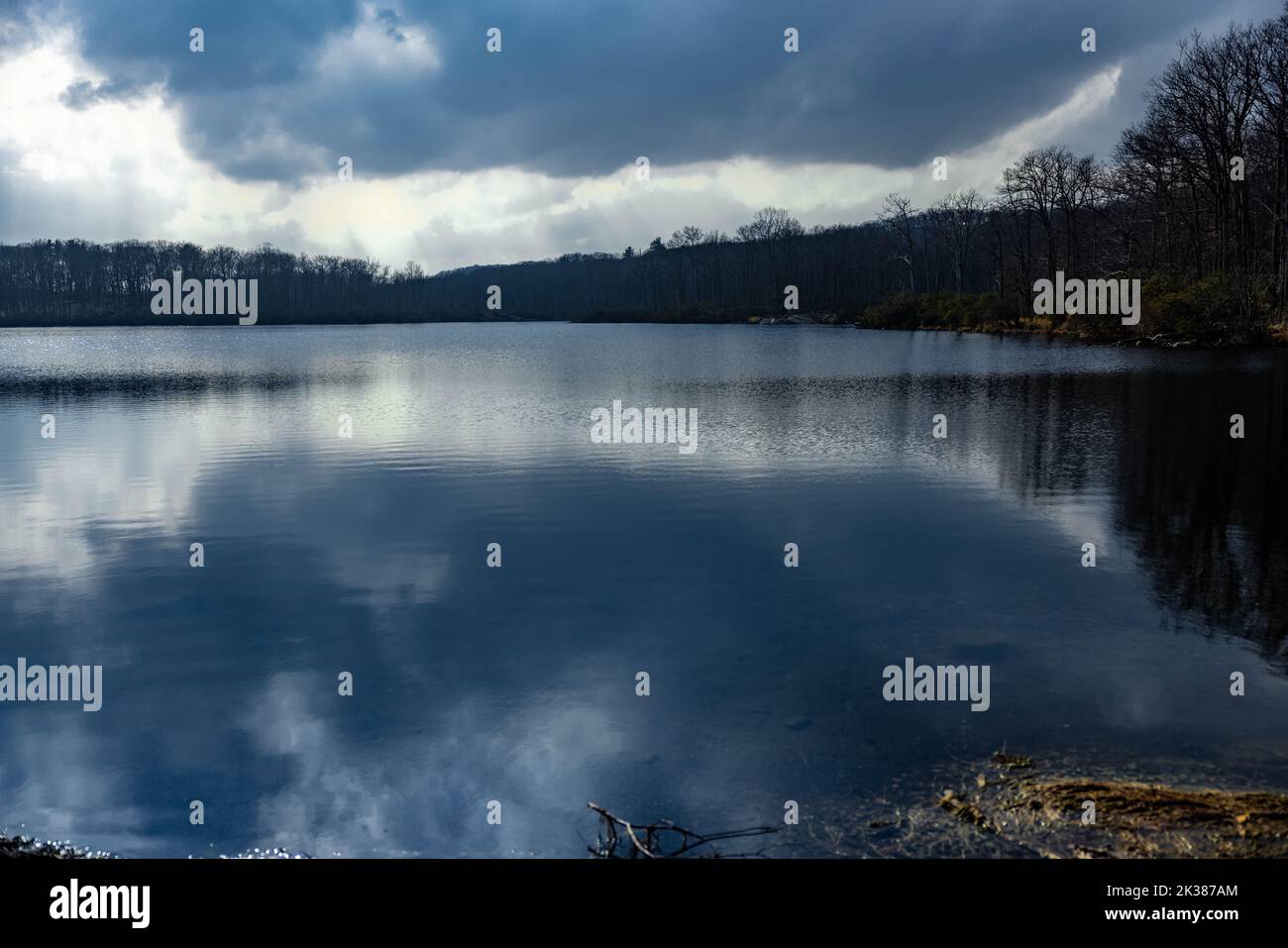 A lake with reflections on an autumn day Stock Photo - Alamy
