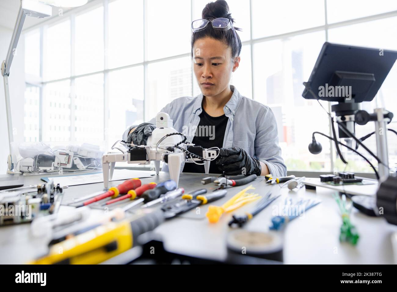 Female robotics engineer working in laboratory Stock Photo Alamy