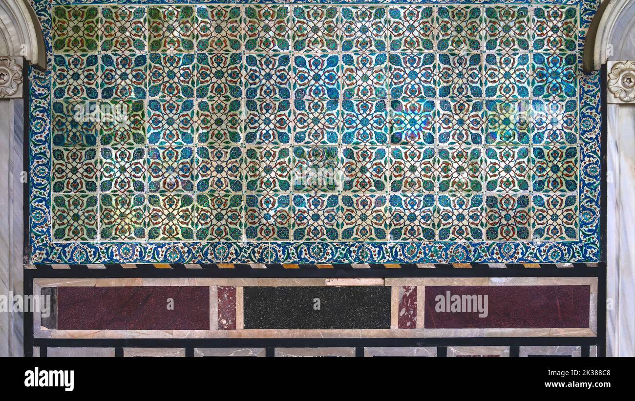 Ancient Ottoman Handmade Turkish Tiles with floral patterns from Topkapi Palace in Istanbul, Turkey.Internal wall of topkapi in Istanbul Stock Photo