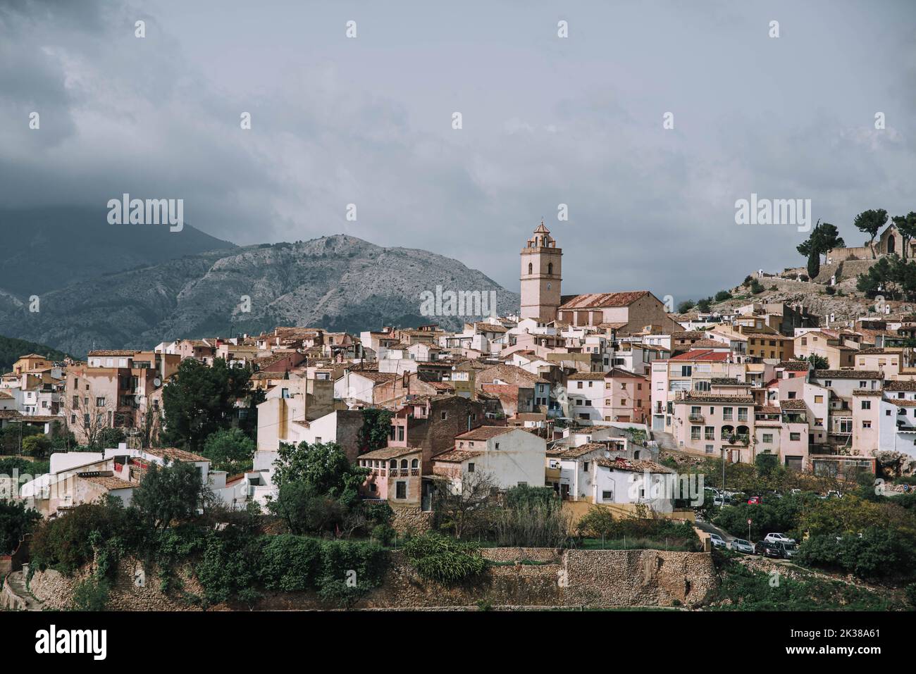 A cityscape of La Nucia in Valencian Community, Spain with mountains in the background Stock Photo