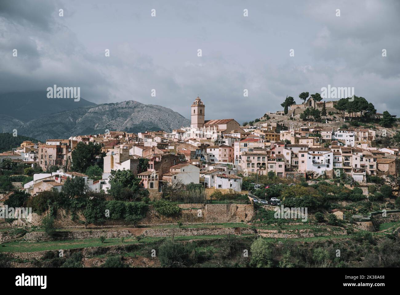 A cityscape of La Nucia in Valencian Community, Spain with mountains in the background Stock Photo