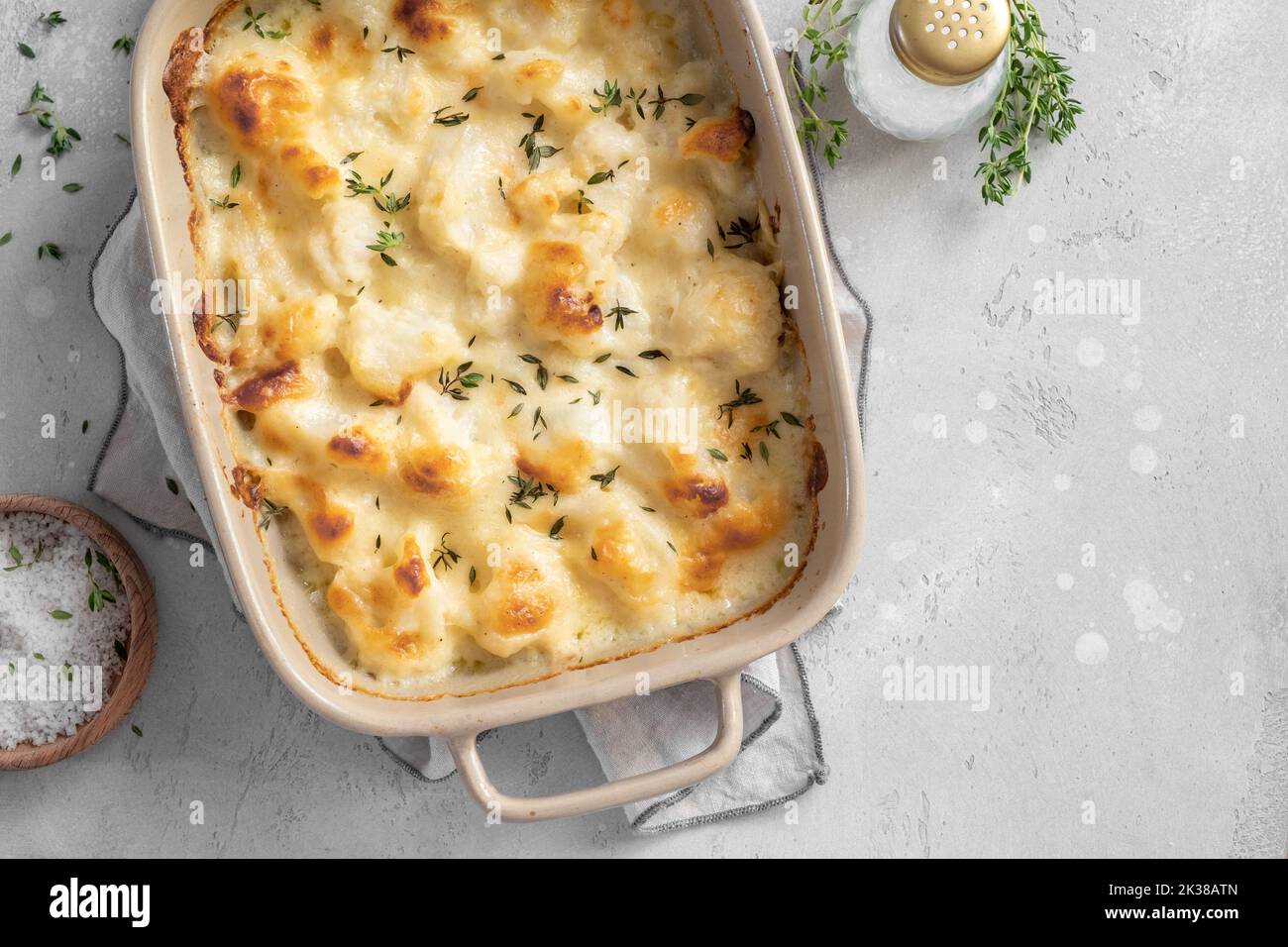 Cauliflower gratin with bechamel sauce with parsley butter Stock Photo