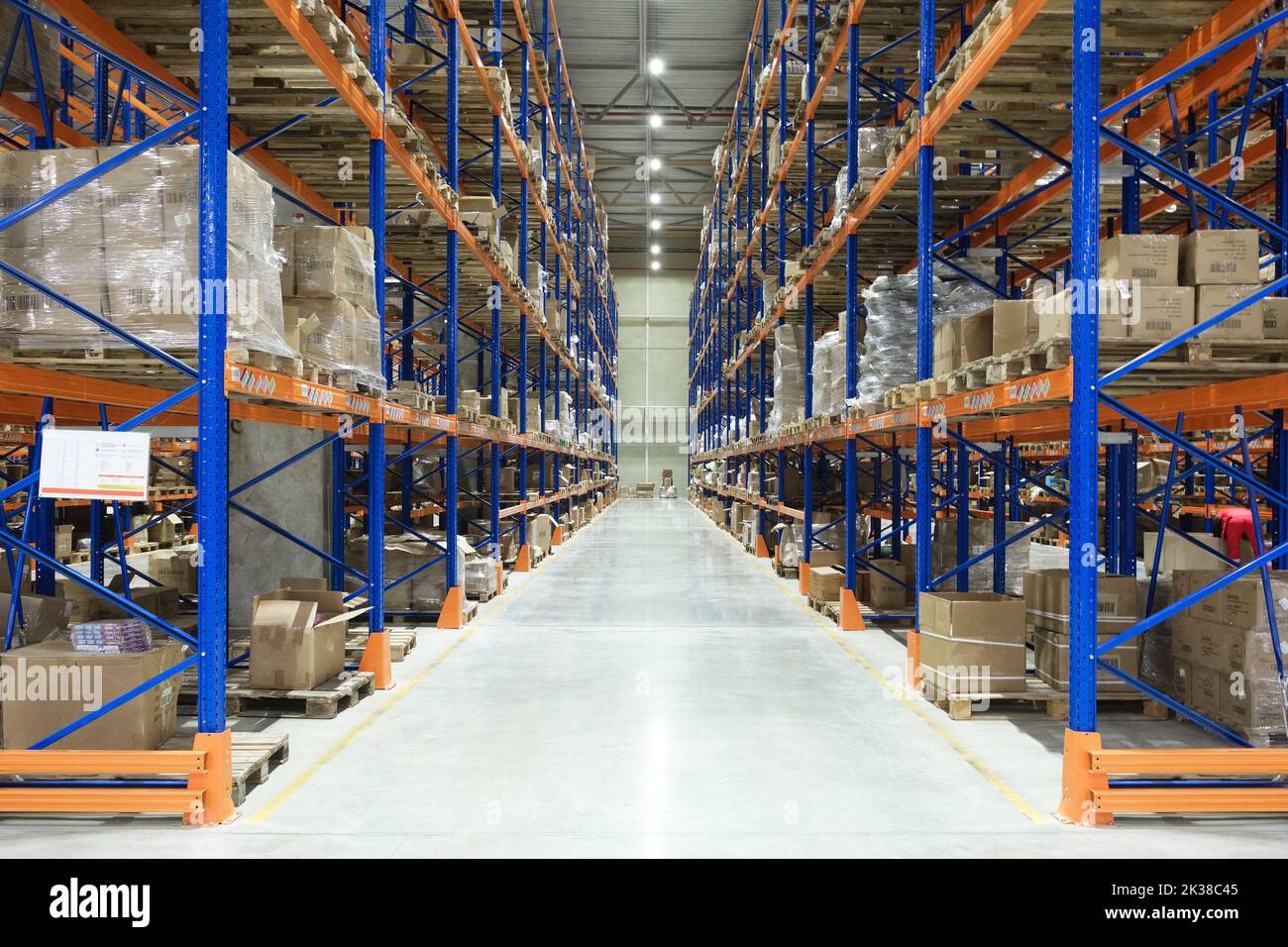warehouse interior with cardboard boxes on shelves close up Stock Photo ...