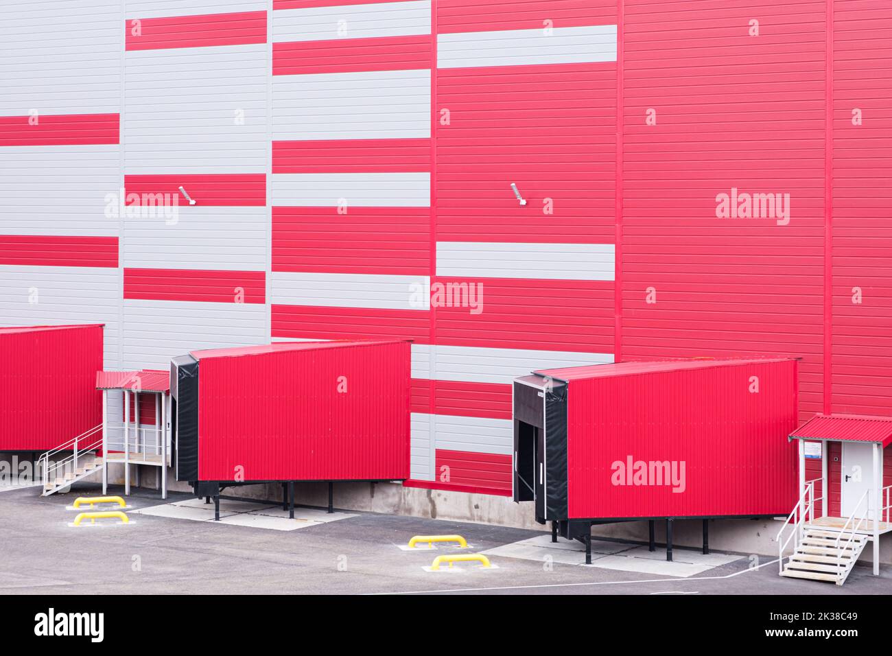 Entrance ramps of a large distribution warehouse with gates for loading