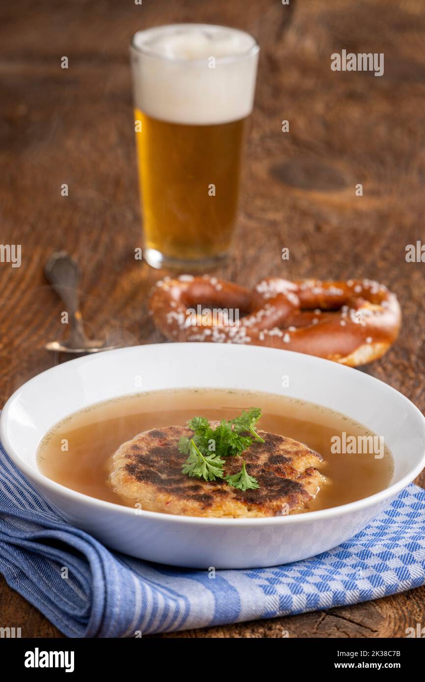 austrian cheese dumpling soup on wood Stock Photo