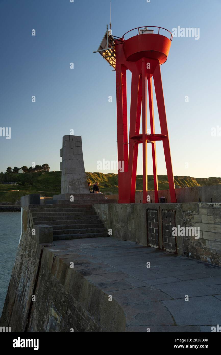 The Harbour and sea wall defences at Port-en-Bessin, Normandie. Stock Photo