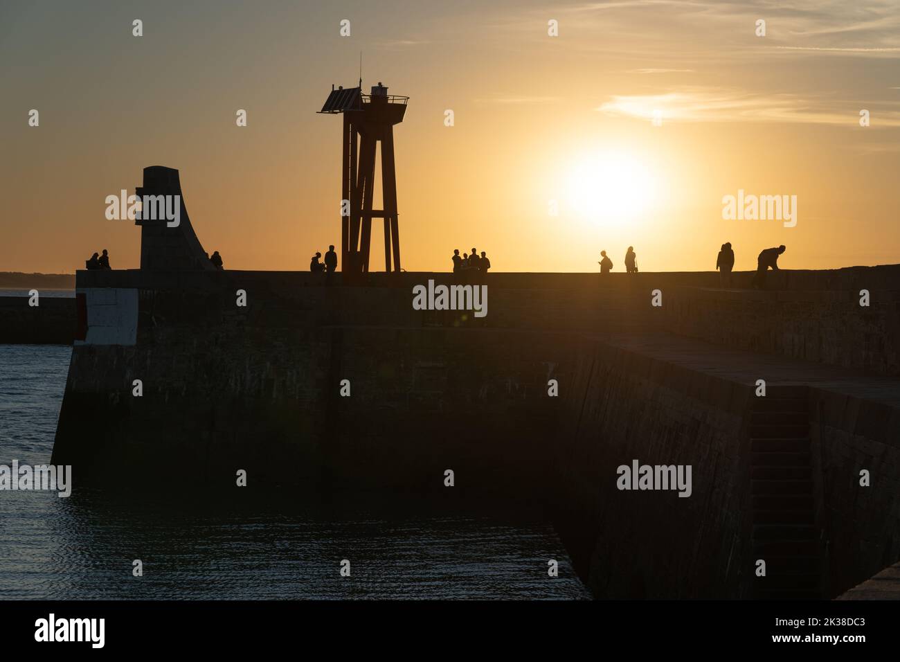 The Harbour and sea wall defences at Port-en-Bessin, Normandie. Stock Photo