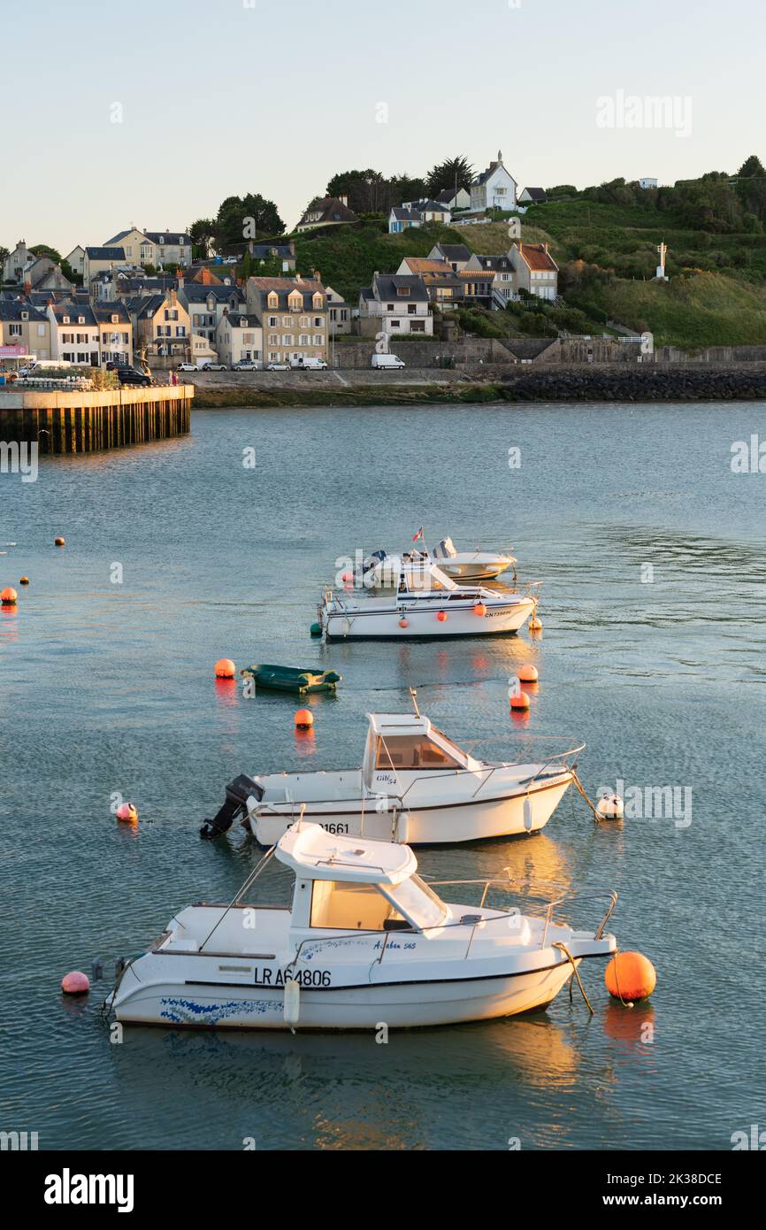 Boats in the harbour at sunset at Port-en-Bessin, Normandie Stock Photo