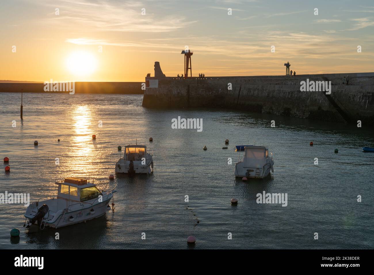 The Harbour and sea wall defences at Port-en-Bessin, Normandie. Stock Photo