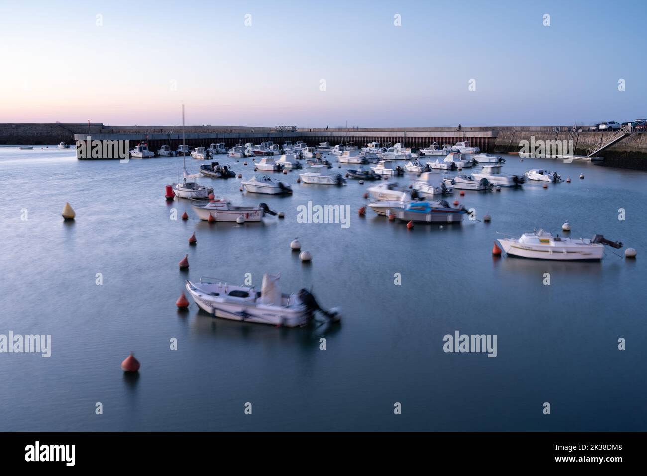 Boats in the harbour at Port-en-Bessin Stock Photo