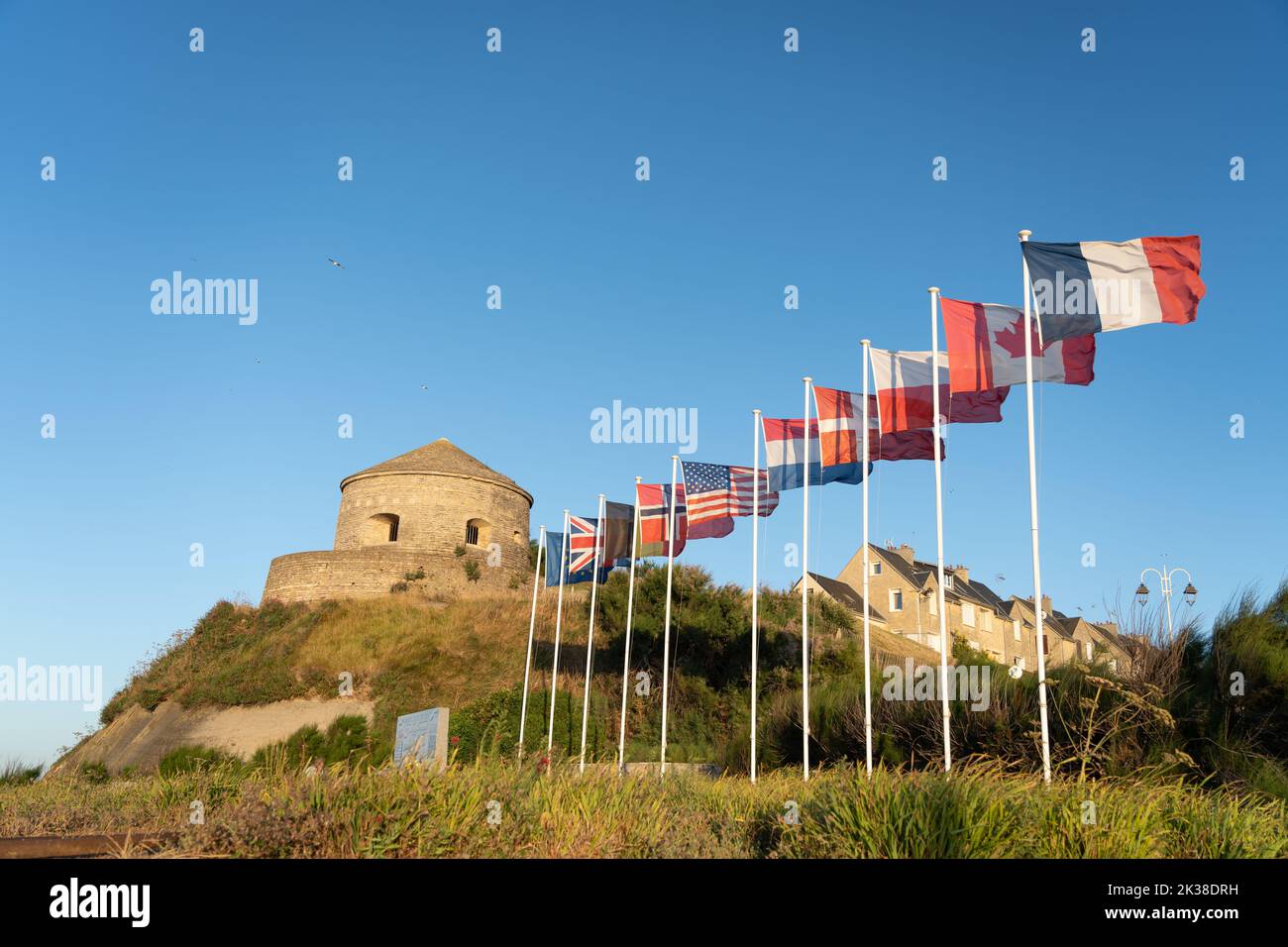 The Vauban tower and Royal Marine Commando memorial garden at Port-en-Bessin Stock Photo