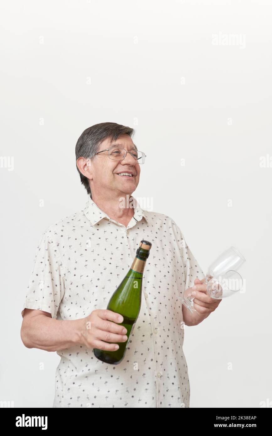 alcohol and beverage concept - older man smelling red wine Stock Photo ...