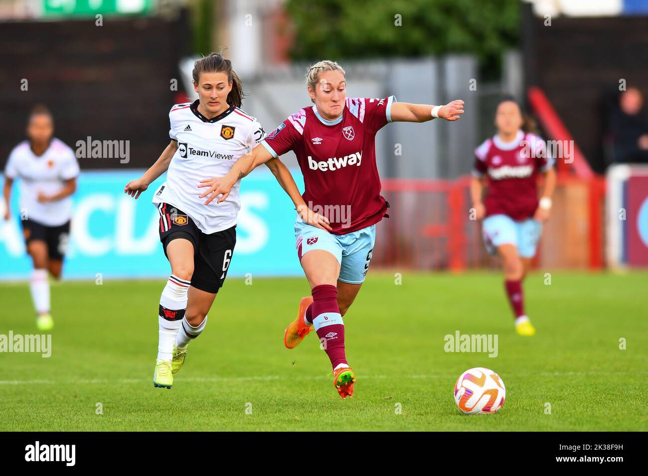 London, UK. 25th Sep, 2022. Dagenham and Redbridge, England, Sept 25 2022. Hannah Blundell (6 Manchester United) and Claudia Walker (9 West Ham United) challenge for the ball during the Barclays Womens Super League football match between West Ham United v Manchester United at Victoria Road Stadium, Dagenham, England. (Kevin Hodgson/SPP) Credit: SPP Sport Press Photo. /Alamy Live News Stock Photo
