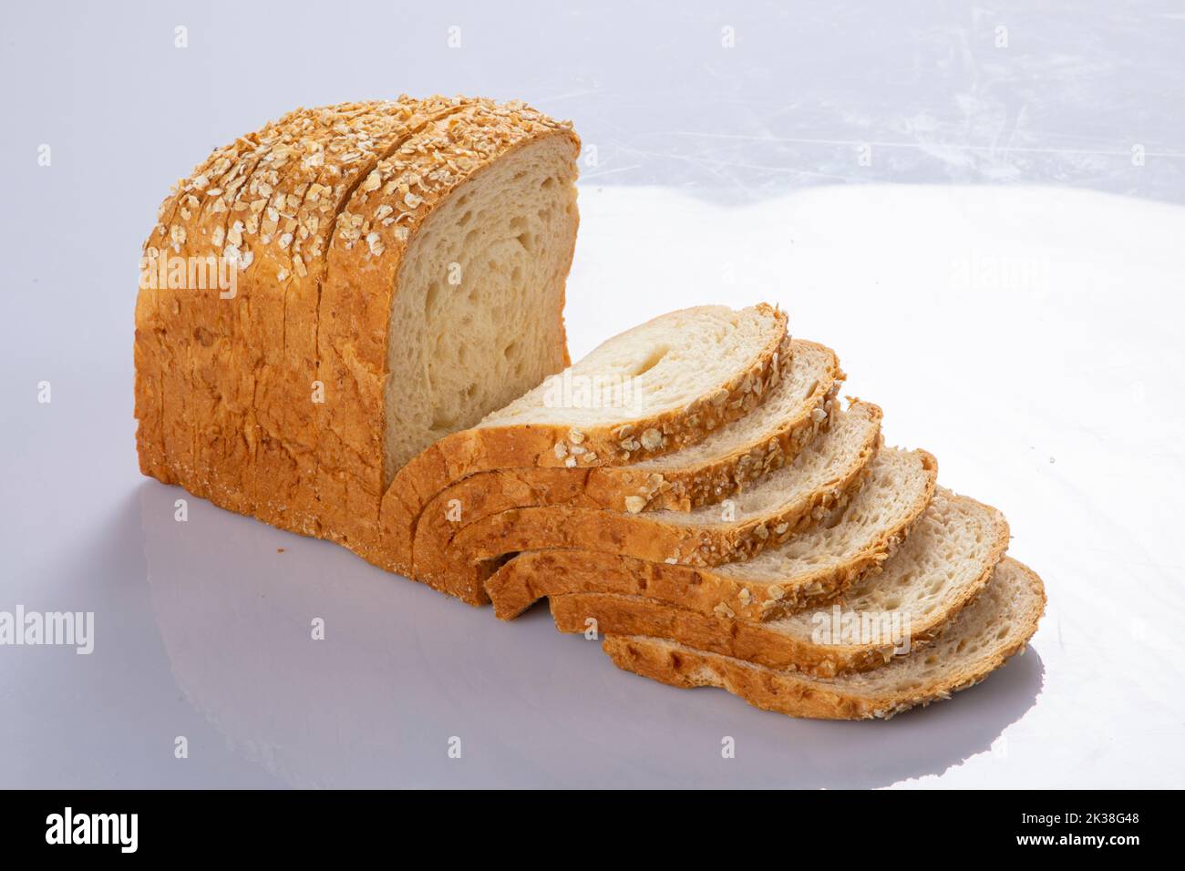 Slice of bread isolated on white background Stock Photo - Alamy