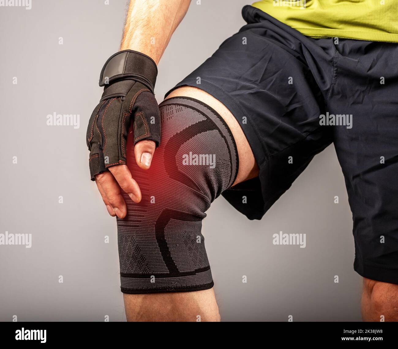 Knee pain, gym trauma. Athlete and painful meniscus. High quality photo Stock Photo