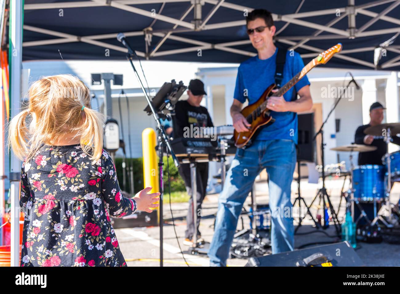 Impact, a Boston band, performing at the West Concord Porchfest, an annual grassroots community music festival in West Concord, Massachusetts. Stock Photo