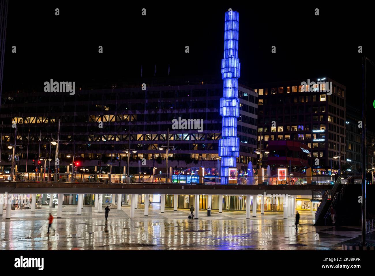 STOCKHOLM - Sweden, March 7, 2021, view of the Sergels Torg square at night with a glass obelisk in the city center with traffic Stock Photo