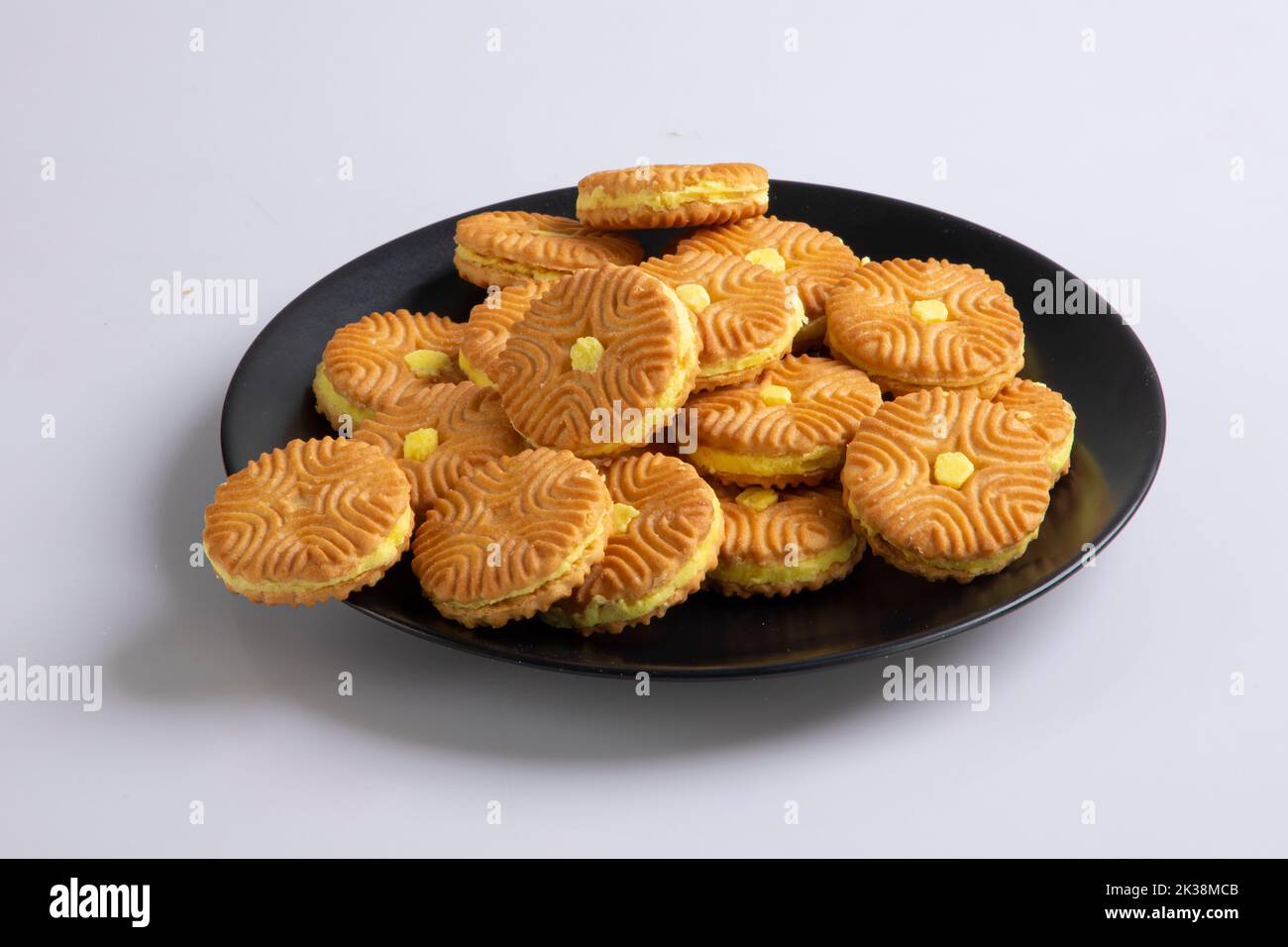 Sandwich cookies with milk cream. Isolated on white background Stock Photo Alamy