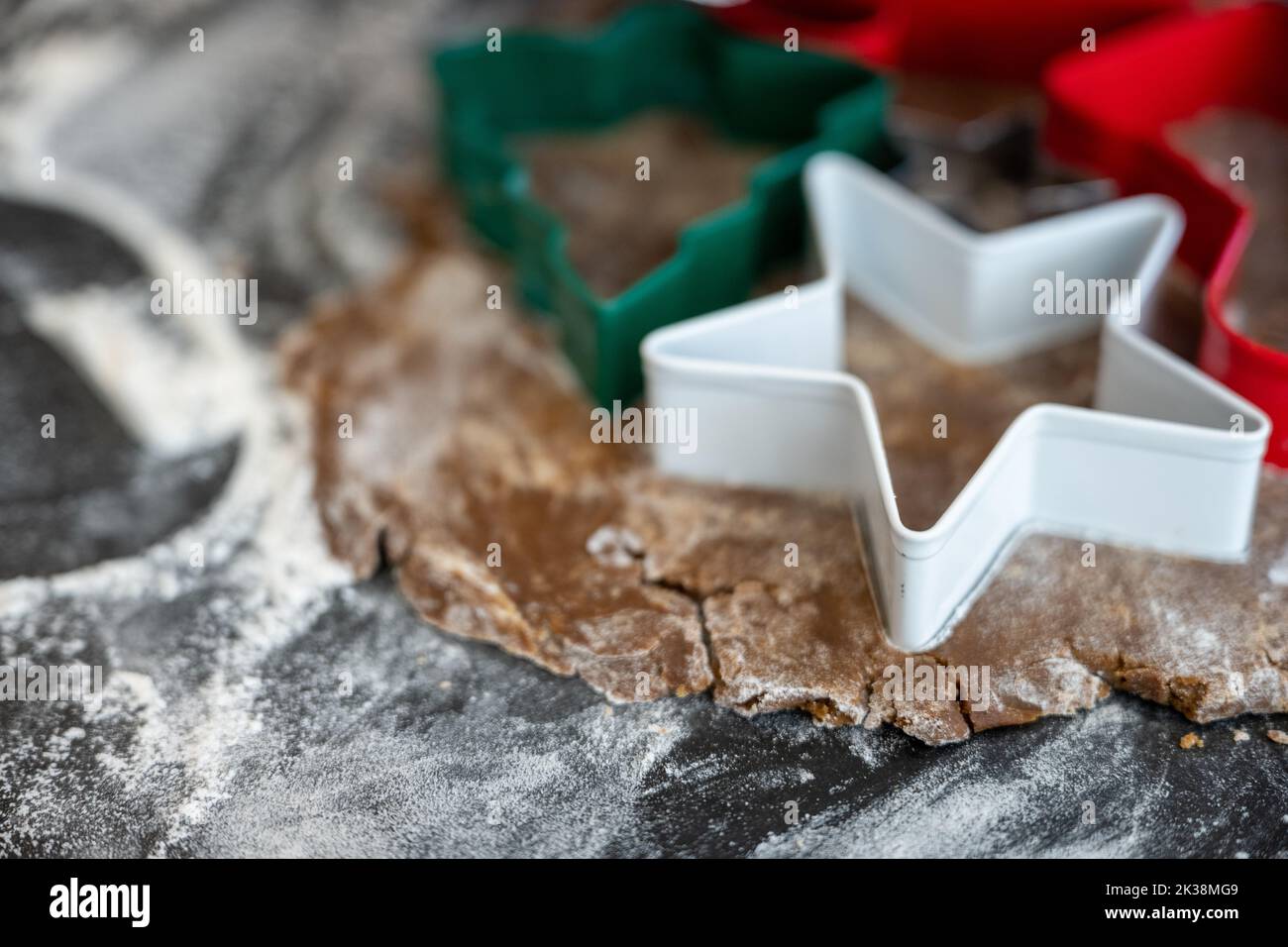 Star Christmas Cookie Cutter on Dough with copy space to left Stock Photo
