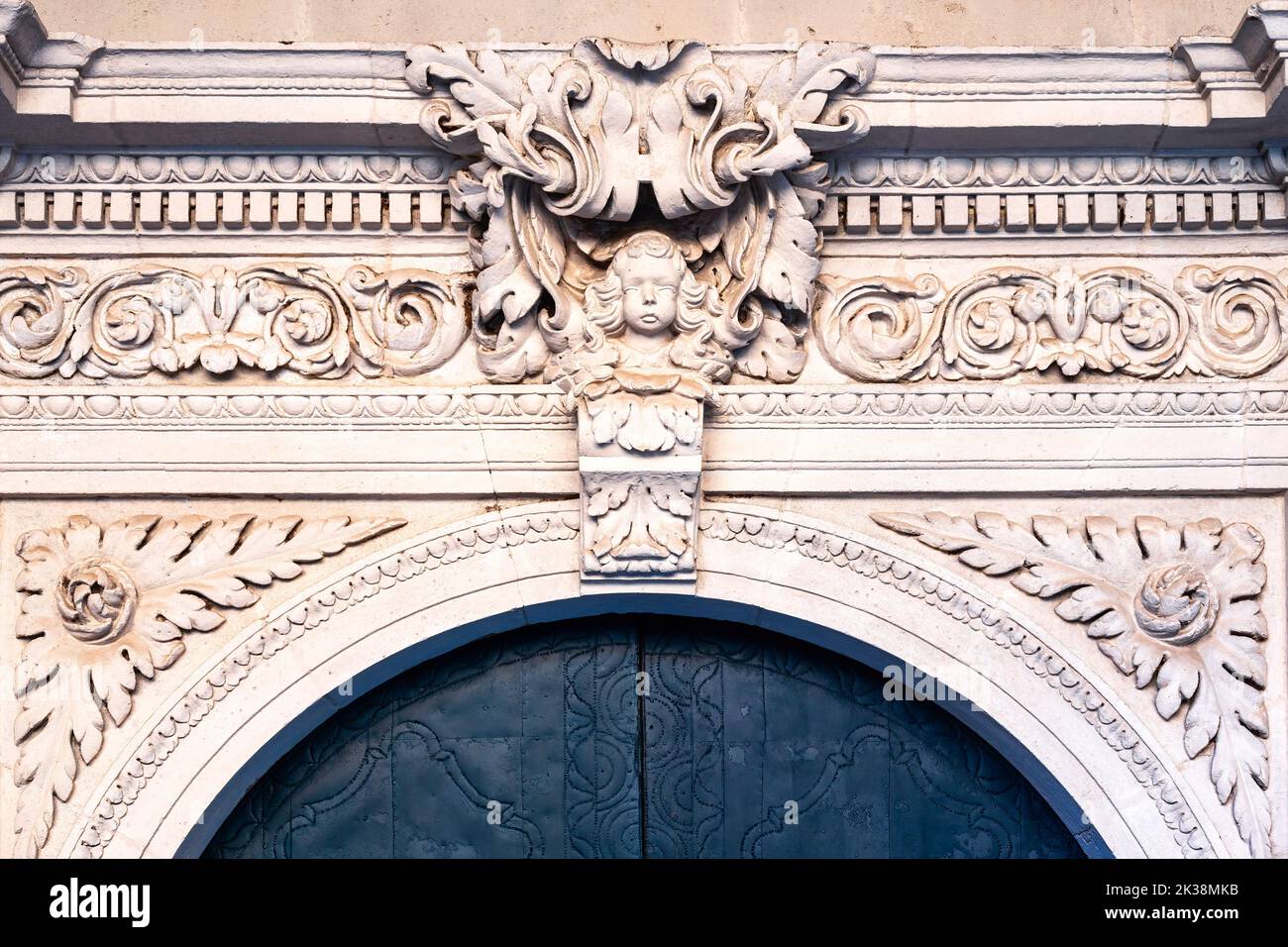 Intricacy of stone carvings decorating the walls of the medieval building. Stock Photo