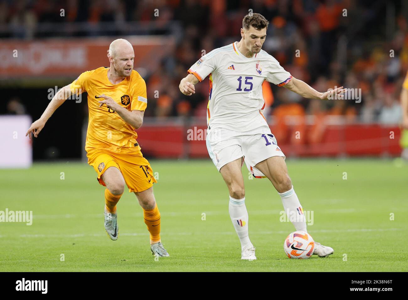 Netherlands' Davy Klaassen and Belgium's Thomas Meunier fight for the ball during a soccer game between the Netherlands and Belgian national team the Red Devils, Sunday 25 September 2022 in Amsterdam, the Netherlands, the sixth and last game in the Nations League A group stage. BELGA PHOTO BRUNO FAHY Stock Photo