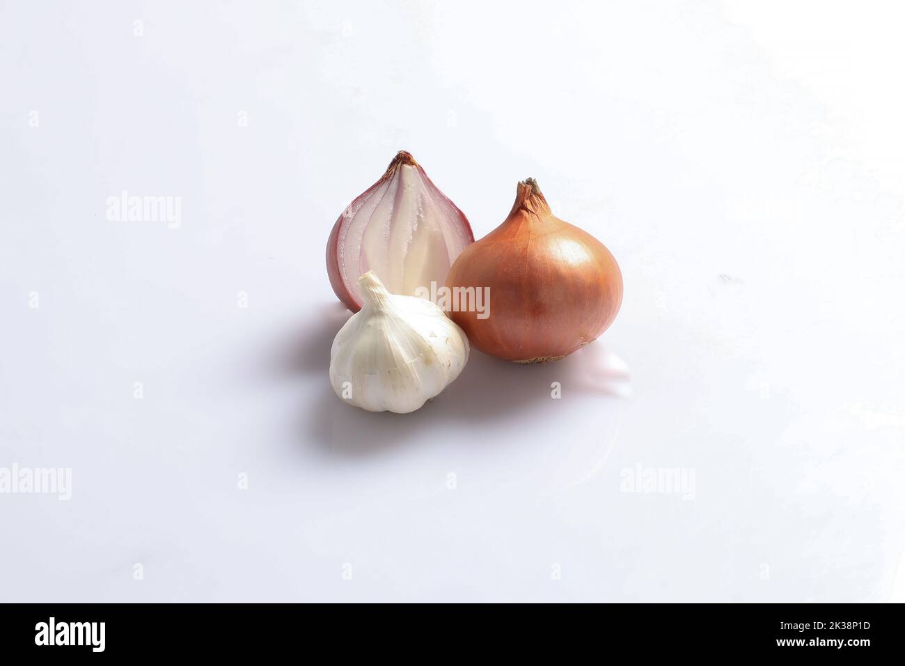 Onion and garlic slice isolated on white background Stock Photo - Alamy
