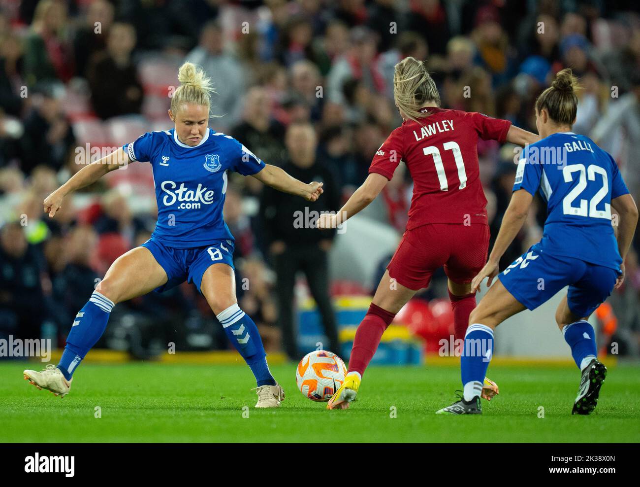 Liverpool, UK. 25th Sep, 2022. Izzy Christiansen (#8 Everton) attempts to tackle Melissa Lawley (#11 Liverpool) during the Barclays Womens Super League fixture between Liverpool and Everton at Anfield in Liverpool, England. (James Whitehead/SPP) Credit: SPP Sport Press Photo. /Alamy Live News Stock Photo