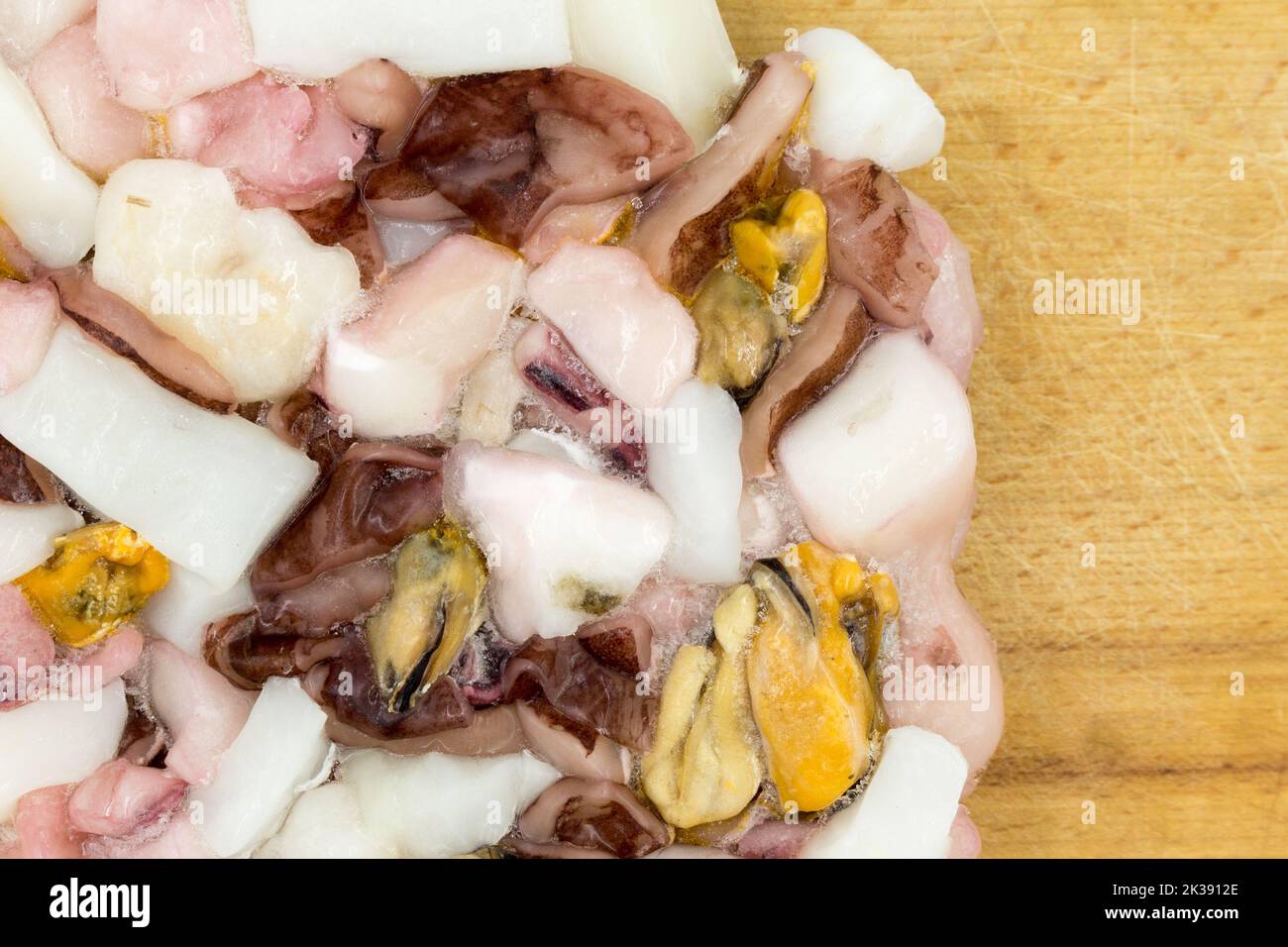 Seafood Cocktail. Frozen seafood mix closeup. Frozen for longterm