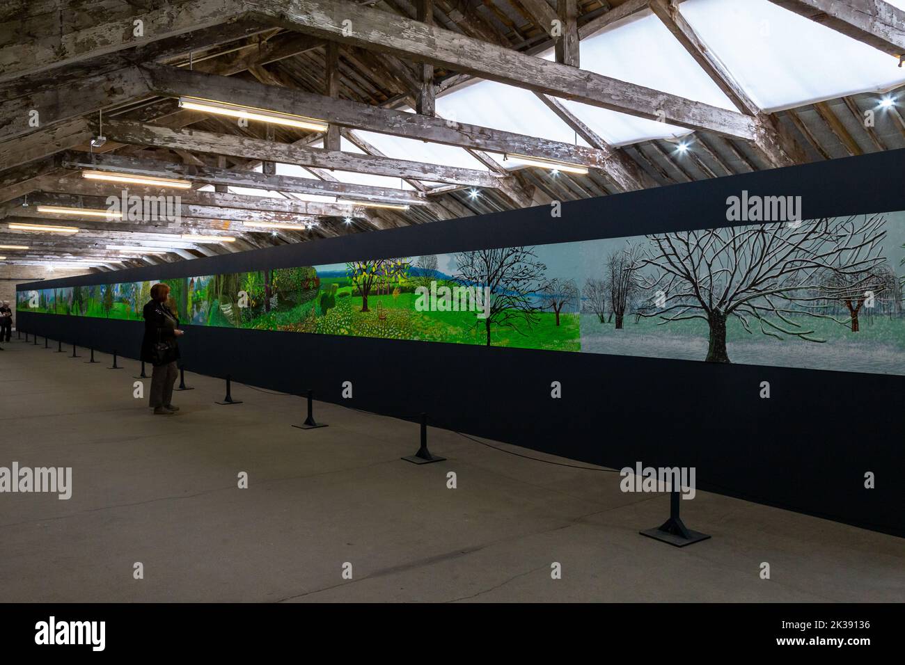'Year in Normandie' painted by David Hockney. This 90m long frieze shows the seasons in Normandy and is exhibited in the roof space of Salts Mill. Stock Photo