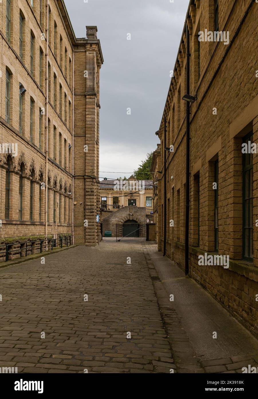 The magnificent Salts Mill building in Saltaire, Yorkshire. Salts Mill is a former textile mill, now home to an art gallery with small businesses. Stock Photo