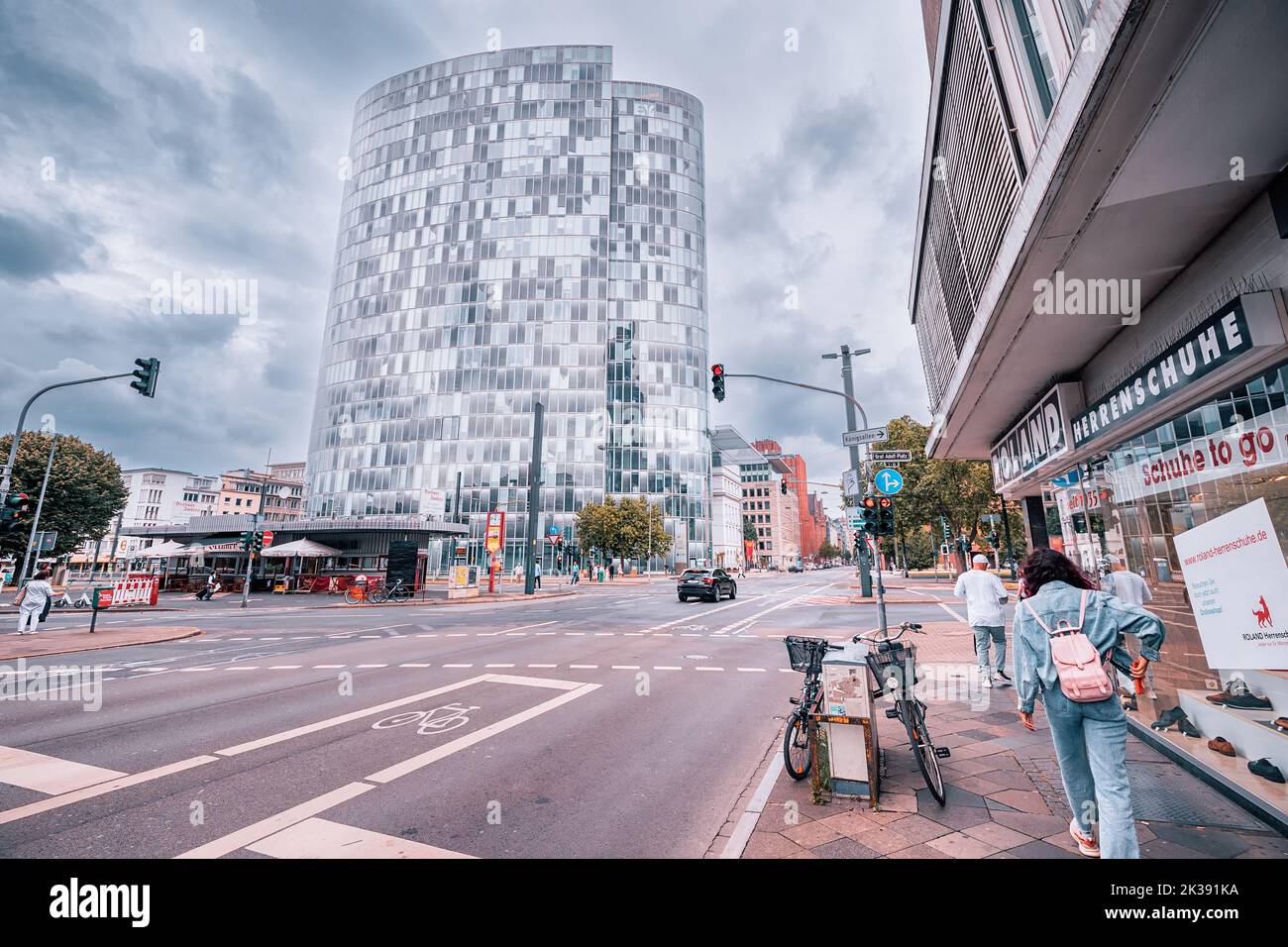21 July 2022, Dusseldorf, Germany: A street and glass skyscrapers with commercial real estate in a lively area of Dusseldorf Stock Photo