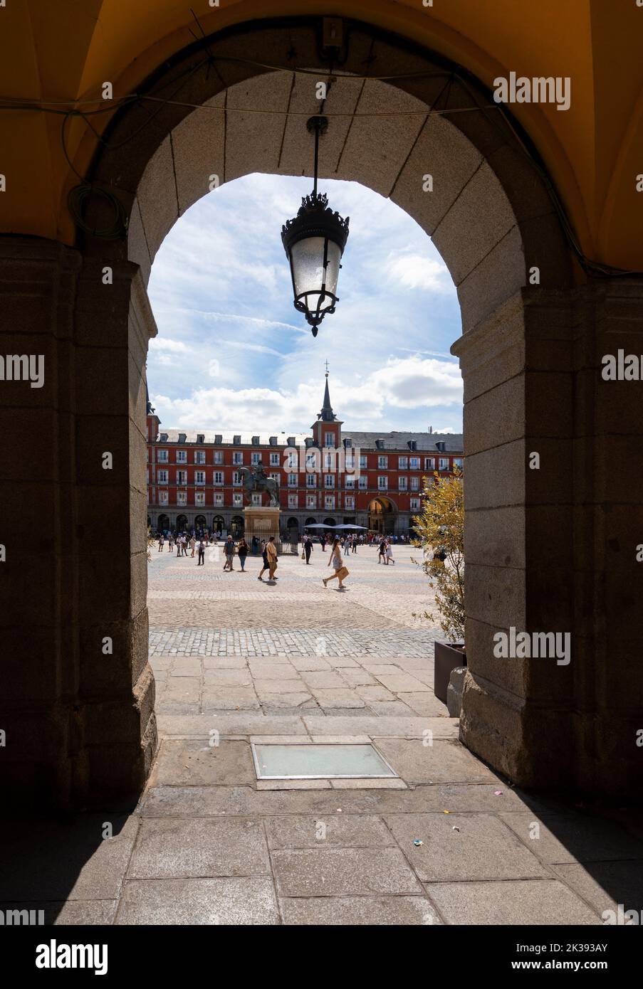 Madrid, Spain, September 2022.  view between the arcades of the historic plaza mayor in the city center Stock Photo