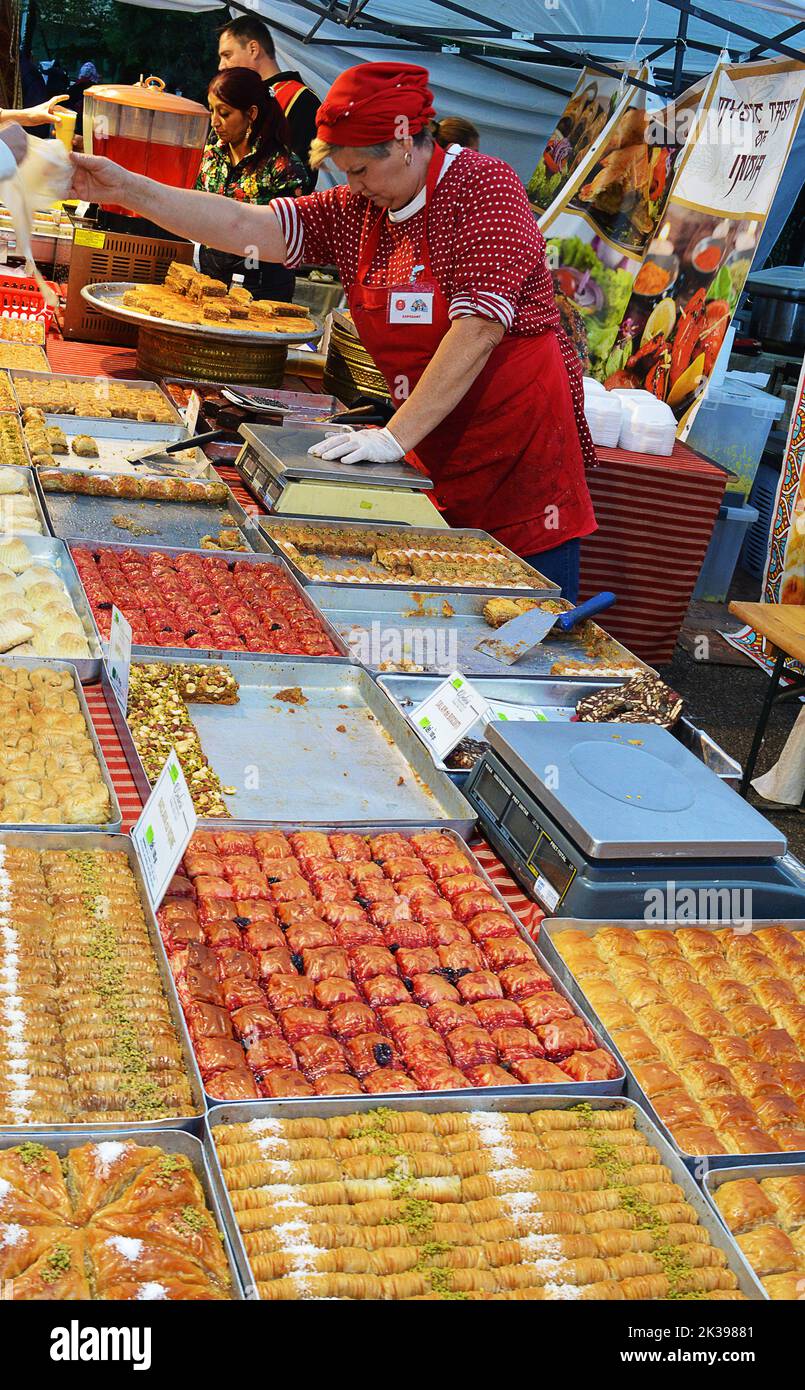 BUCHAREST, ROMANIA - 24 SEPTEMBER 2022: a stall selling baklava and other Turkish sweets at Asiafest 2022 in Parcul National Stock Photo